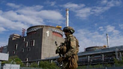 A Russian serviceman patrols the territory of the Zaporizhzhia Nuclear Power Plant on May 1, 2022.