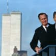 After a meeting in New York, President Ronald Reagan, Vice President George Herbert Walker Bush and Soviet General Secretary Mikhail Gorbachev pose with the World Trade Center in the background.