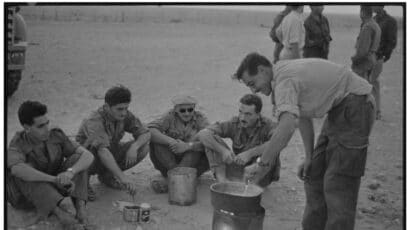 French soldiers cooking in the Algerian Sahara in 1961.