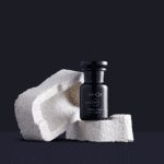 A bottle in white packaging