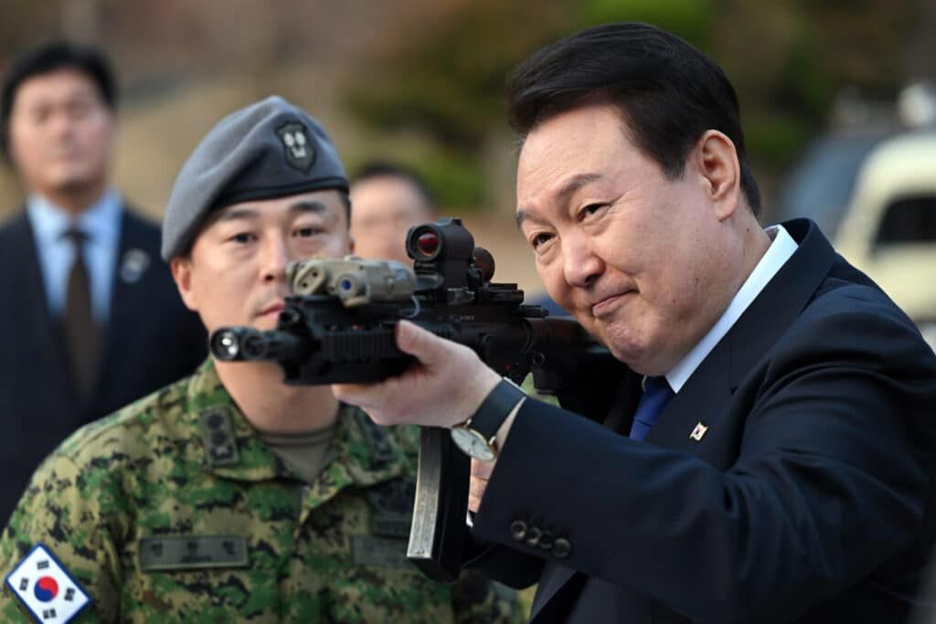 South Korean President Yoon aiming a large gun