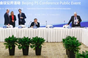 Delegation members from the UN Security Council's five permanent members (P5), from left to right: Philip Barton of Britain, Andrea Thompson of the United States, Nicolas Roche of France, Fu Cong of China, and Oleg Rozhkov of Russia, attend a panel discussion after the Treaty on the Non-Proliferation of Nuclear Weapons (NPT) conference in Beijing in January 2019. Photo by Thomas Peter/AFP via Getty Images.