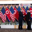 Donald Trump and Kim Jong-un shake hands