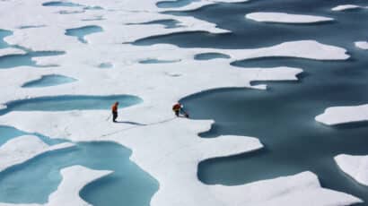 Melt ponds on top of sea ice in the Arctic Ocean, two researchers
