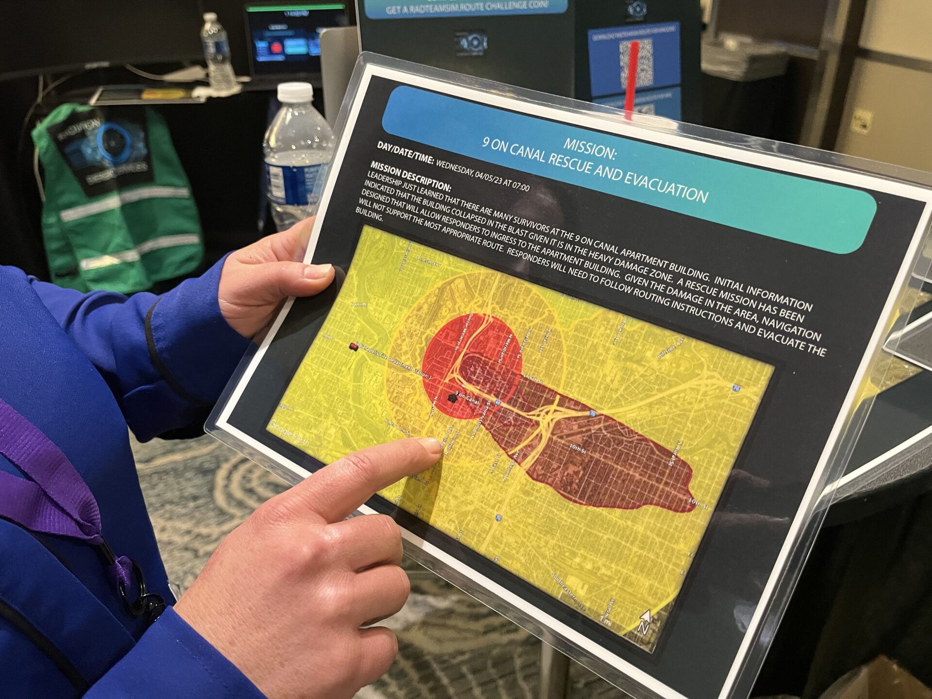 Wendy Renno explains one of the training missions from the nuclear detonation drill that used the RadTeamSim.Route driving simulator she designed. Renno previously worked for the Department of Energy's Federal Radiological Monitoring and Assessment Center, including during its response to the 2011 Fukushima Daiichi nuclear plant emergency.