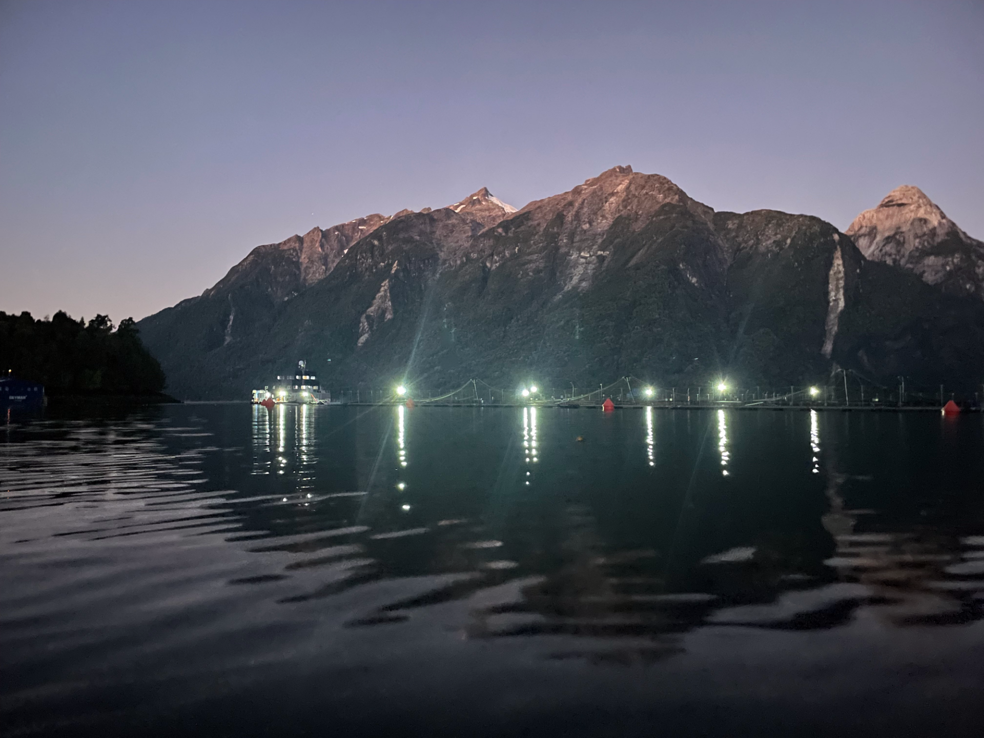 Night lights at a salmon farm in Comau Fjord. (Photo: Jessica McKenzie)