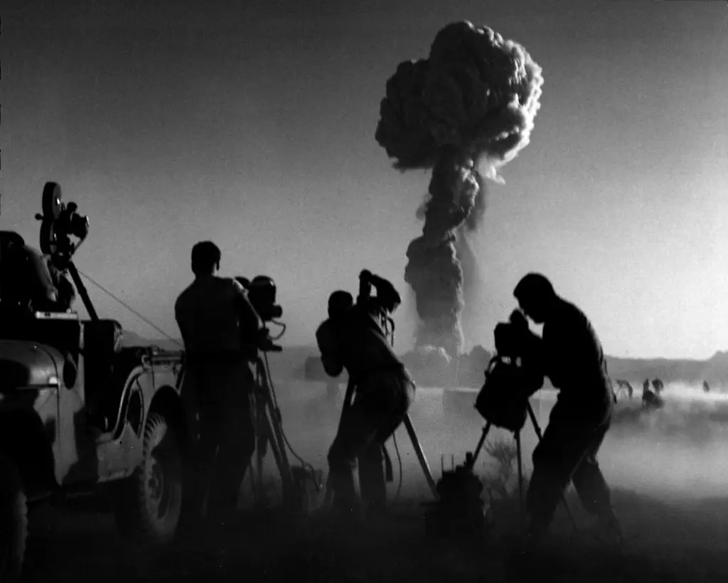 Photographers filming an atom bomb test 1957