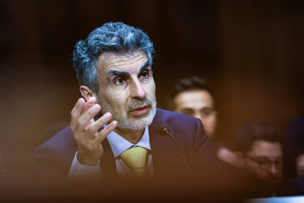 Yoshua Bengio, founder and scientific director of Mila at the Quebec AI Institute, during a Senate Judiciary Subcommittee on Privacy, Technology and the Law hearing in July. The hearing was titled "Oversight of A.I.: Principles for Regulation." Photo credit: Valerie Plesch/Bloomberg via Getty Images