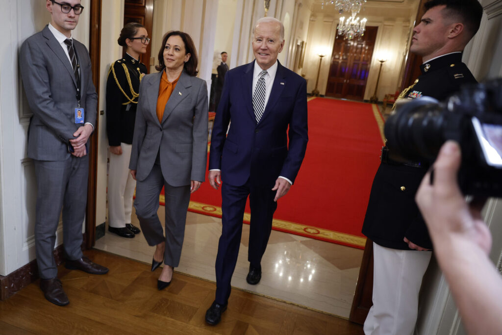 President Joe Biden and Vice President Kamala Harris arrive to announce the Biden administration's approach to artificial intelligence Monday. President Biden issued a new executive order on Monday, directing his administration to create a new chief AI officer, track companies developing the most powerful AI systems, adopt stronger privacy policies, and "both deploy AI and guard against its possible bias," creating new safety guidelines and industry standards. (Photo by Chip Somodevilla/Getty Images)