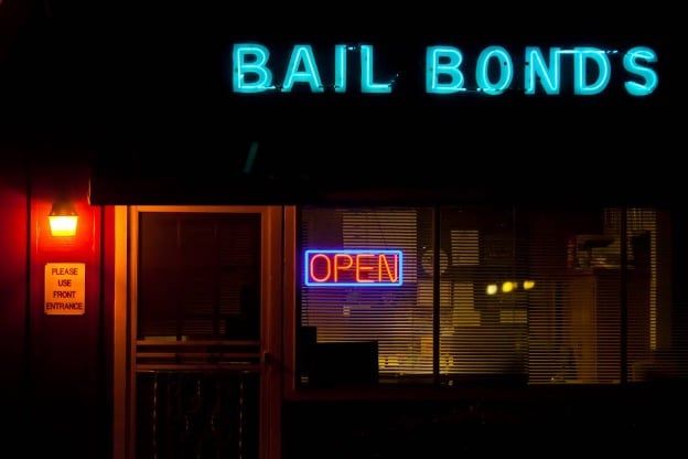 neon sign for bail bonds at night