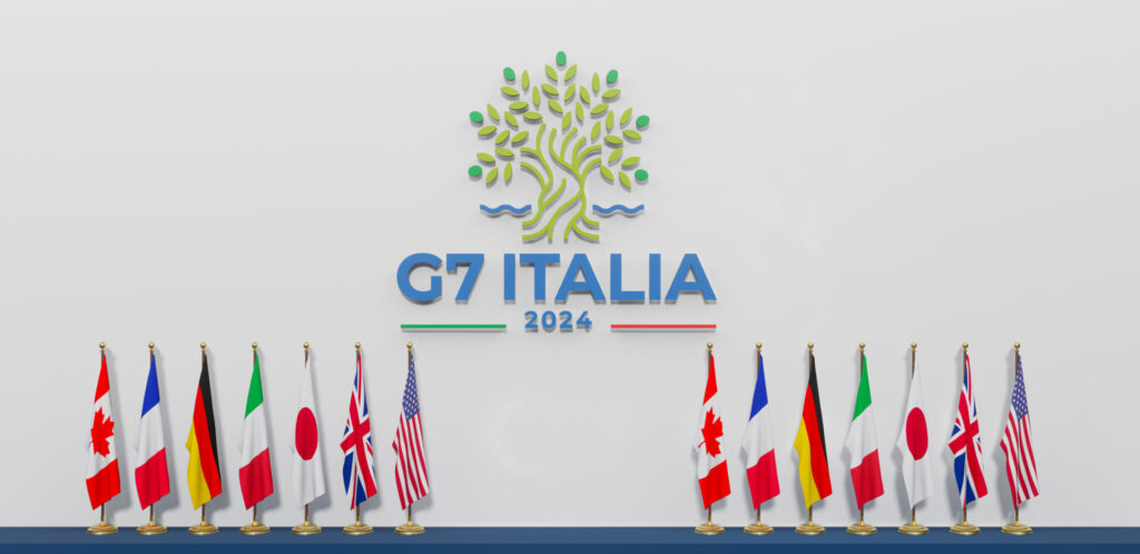 G7 Italia sign with flags of participating nations