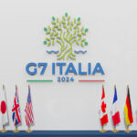 G7 Italia sign with flags of participating nations