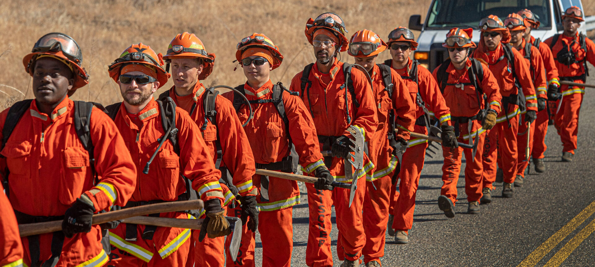 Inmates at work during a controlled burn at Eastman Lake in Madera County, California, in May 2021. (Cal Fire)