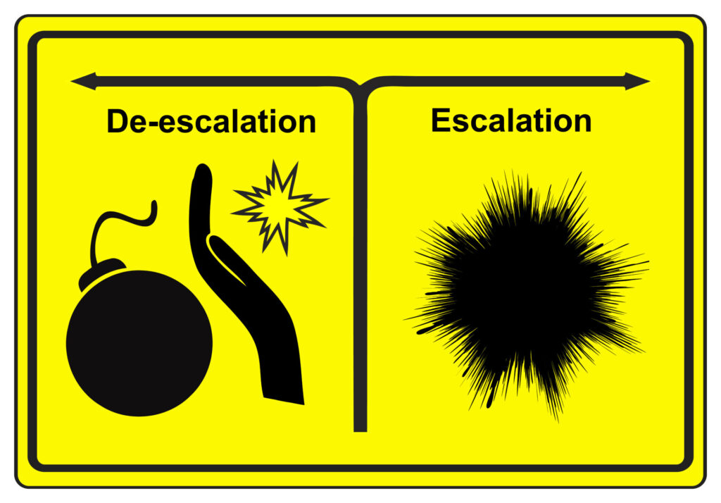 an illustration showing escalation as an explosion and de-escalation as a hand preventing a bomb from exploding