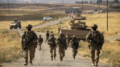 US Army soldiers walking in Syria