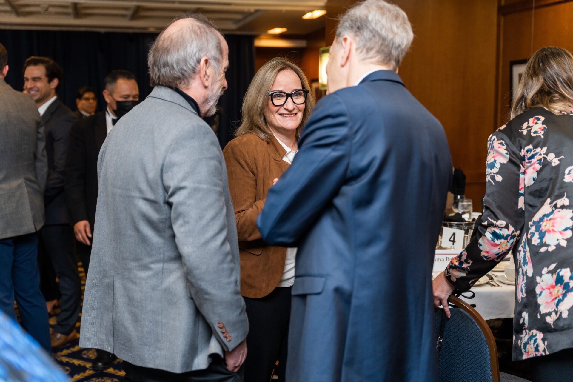 Bulletin editor-in-chief John Mecklin (left), Bulletin President and CEO Rachel Bronson (center), and CEO of Lightbridge Corporation Seth Grae (right) converse during the 2023 Doomsday Clock Leadership Luncheon. Photo by Jamie Christiani.
