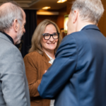 Bulletin editor-in-chief John Mecklin (left), Bulletin President and CEO Rachel Bronson (center), and CEO of Lightbridge Corporation Seth Grae (right) converse during the 2023 Doomsday Clock Leadership Luncheon. Photo by Jamie Christiani.