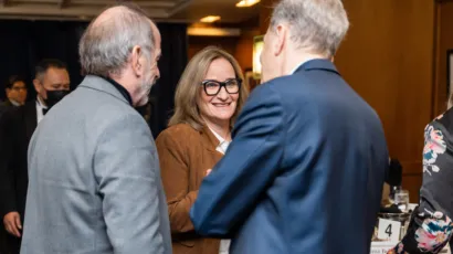 Bulletin editor-in-chief John Mecklin (left), Bulletin President and CEO Rachel Bronson (center), and CEO of Lightbridge Corporation Seth Grae (right) converse during the 2023 Doomsday Clock Leadership Luncheon. Photo by Jamie Christiani.