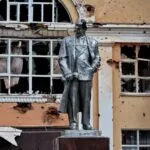 A damaged statue of the founder of the Soviet Union, Vladimir Lenin, in the Ukrainian-controlled Russian town of Sudzha, Kursk region, on August 16. (Photo by Yan DOBRONOSOV/AFP via Getty Images)