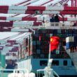 Fully-loaded container ships berth at a dock at the Port of Qingdao in Qingdao city, east Chinas Shandong province. DepositPhotos.com.