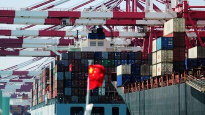 Full-loaded container ships berth at a dock at the Port of Qingdao in Qingdao city, east Chinas Shandong province. DepositPhotos.com.