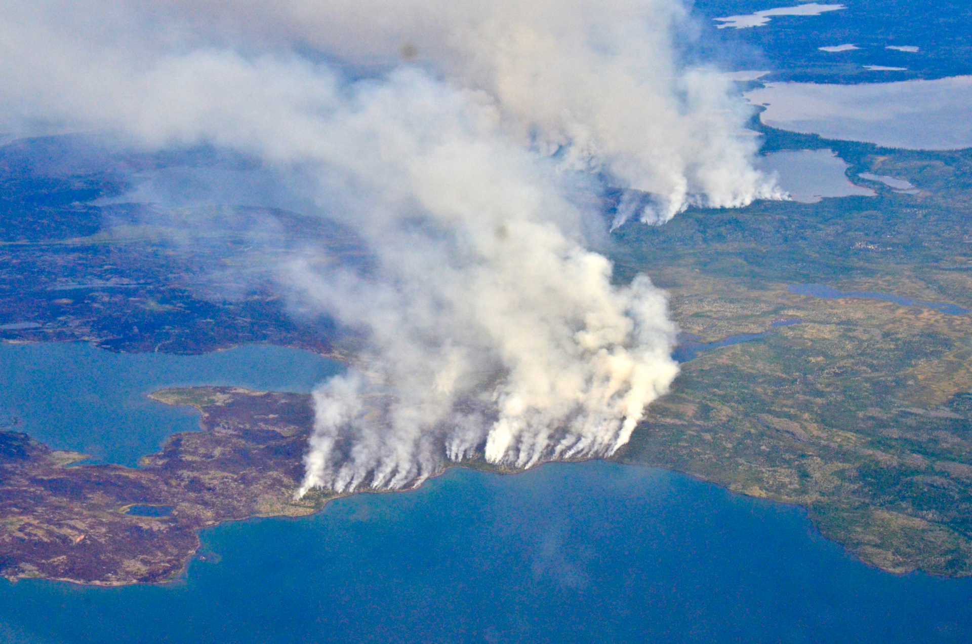 In 2014, megafires in Canada’s Northwest Territories scorched more than 7 million acres of forest, releasing half as much carbon back into the atmosphere as all the plants and trees in Canada typically absorb in an entire year. <span class="credit">
NASA/Peter Griffith</span>