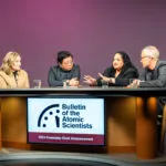 Asha M. George (second to right) speaks at the 2024 Doomsday Clock Announcement alongside, from left to right, Bulletin President and CEO Rachel Bronson and fellow Science and Security Board members Herbert Lin and Alexander Glaser. (Photo: Jamie Christiani).