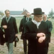 Finnish President Urho Kekkonen (left) and Swedish Prime Minister Olof Palme checking their watches during a meeting in 1975