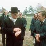 Finnish President Urho Kekkonen (left) and Swedish Prime Minister Olof Palme checking their watches during a meeting in 1975