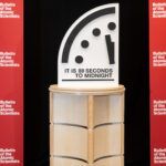 The Doomsday Clock showing "It is 89 seconds to midnight" in between red Bulletin banners. (Photo by Jamie Christiani/Bulletin of the Atomic Scientists)