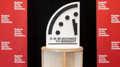 The Doomsday Clock showing "It is 89 seconds to midnight" in between red Bulletin banners. (Photo by Jamie Christiani/Bulletin of the Atomic Scientists)