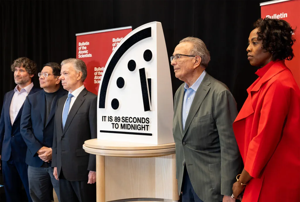 Members of the Bulletin of the Atomic Scientists’ Science and Security Board and Juan Manuel Santos, chair of The Elders and former president of Colombia, announce the setting of the Doomsday Clock on January 28, 2025 at the United States Institute of Peace in Washington, D.C. It is now 89 seconds to midnight. Left to right: Daniel Holz, Herb Lin, Juan Manuel Santos, Robert Socolow, and Suzet McKinney. (Photo by Jamie Christiani/Bulletin of the Atomic Scientists)