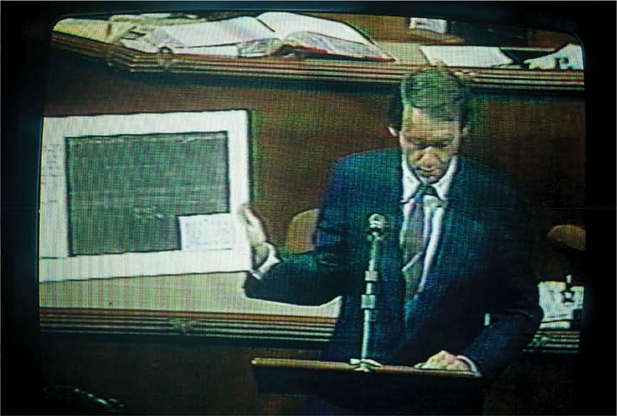 Representative (now Senator) Markey on the floor of the House of Representatives showing the first seismogram on August 8, 1986.