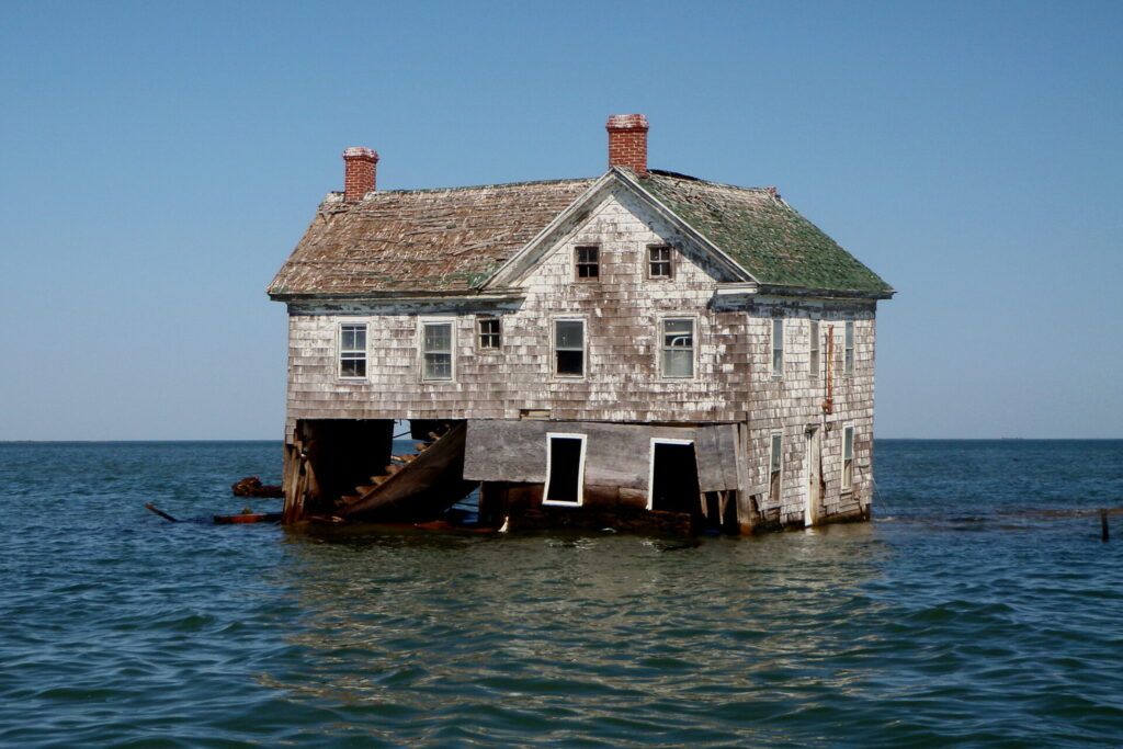 a house surrounded by water