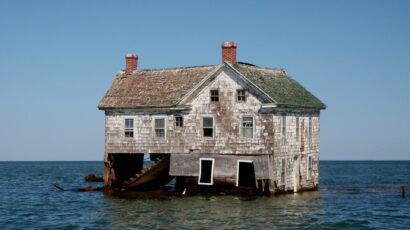 a house surrounded by water