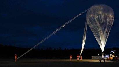 scientists launching balloon to collect atmospheric gases