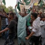 Pakistani people celebrate after the ceasefire between Pakistan and India, in Hyderabad. Pakistan and India agreed to a full and immediate ceasefire on Saturday after days of deadly jet fighter, missile, drone and artillery attacks. The news surprisingly announced by US President Donald, who congratulated them on using "common sense". (Photo by AKRAM SHAHID/AFP via Getty Images)