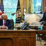 US President Donald Trump listens to US Secretary of Defense Pete Hegseth speak about the Golden Dome missile defense shield in the Oval Office on May 20. (Photo by JIM WATSON/AFP via Getty Images)