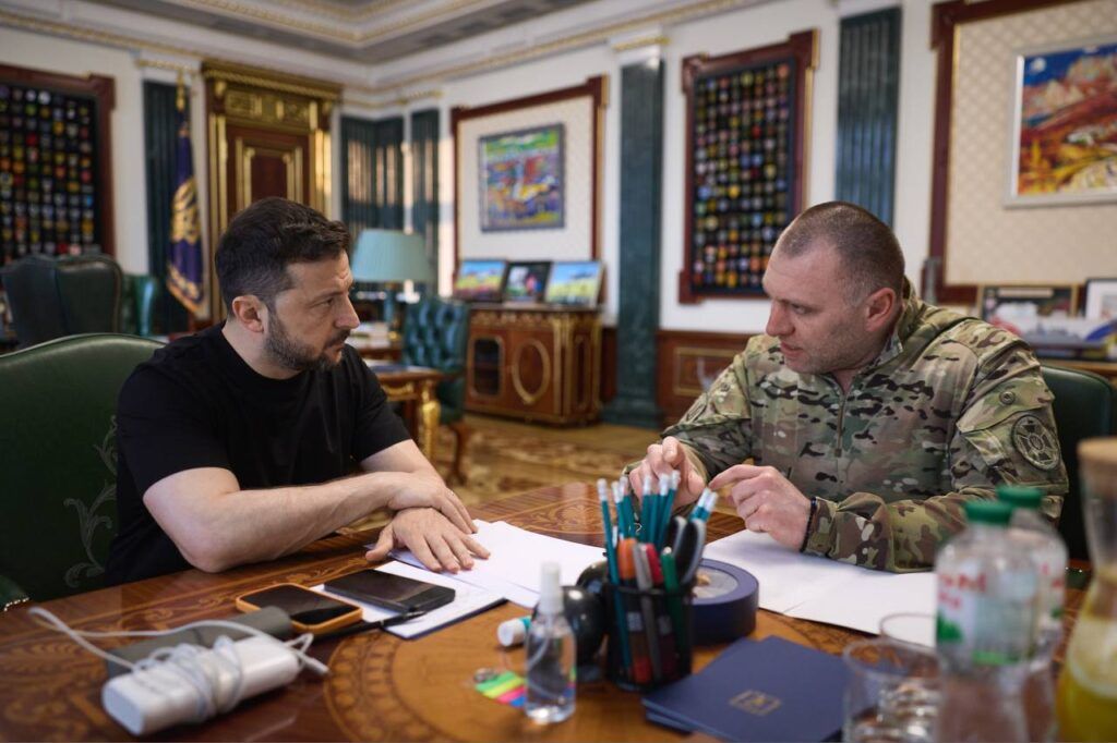 President of Ukraine Volodymyr Zelensky listening to the Head of the Security Service of Ukraine Vasyl Malyuk