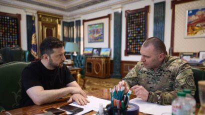 President of Ukraine Volodymyr Zelensky listening to the Head of the Security Service of Ukraine Vasyl Malyuk