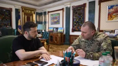 President of Ukraine Volodymyr Zelensky listening to the Head of the Security Service of Ukraine Vasyl Malyuk