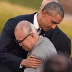 US President Barack Obama embraces an a-bomb victim at the Hiroshima Peace Memorial Park on May 27, 2016 in Hiroshima, Japan. It was the first time a US president made an official visit to Hiroshima, the site where the atomic bomb was dropped on August 6, 1945. (Photo by Atsushi Tomura/Getty Images)