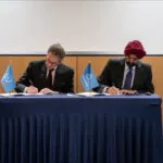 World Bank Group President Ajay Banga and IAEA Director Rafael Mariano Grossi sign a partnership agreement to support the safe, secure, and responsible use of nuclear energy in developing countries, during their meeting in Paris, France, in June 2025. Martin Amaldo / World Bank