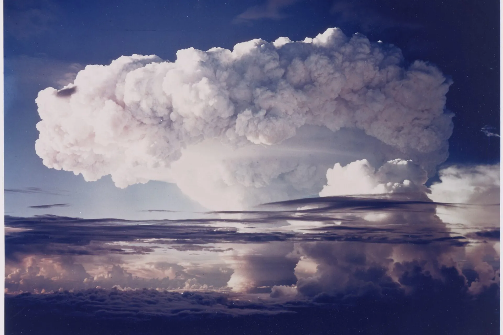Explosion of the first hydrogen bomb, during a test on Eniwetok Atoll in the Marshall Islands, as part of Operation Ivy Mike on November 1, 1952. Sometimes called the “Super” bomb at the time, this was to be the first full-blown test of what was to become known as the Teller-Ulam design for a fusion device. Edward Teller pressed for the first hydrogen bomb test, which was conducted just days before a presidential election. Public domain image, courtesy of US Department of Energy, Office of Public Affairs, via Wikimedia Commons