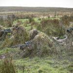 snipers in camouflage