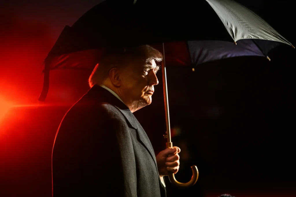 Donald Trump under an umbrella, January 9, 2026