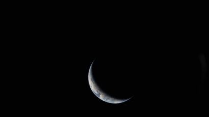 sliver of earth photographed from space against black space