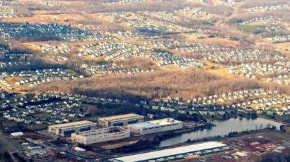 Aerial view of massive data centers under construction in Northern Virginia suburbs