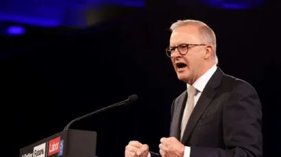 Anthony Albanese speaking at a podium with the Labor party logo and the slogan “A Better Future.”