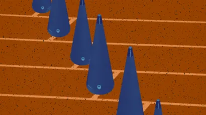 A series of blue cones arranged in a diagonal line on a textured orange surface with horizontal grid lines.